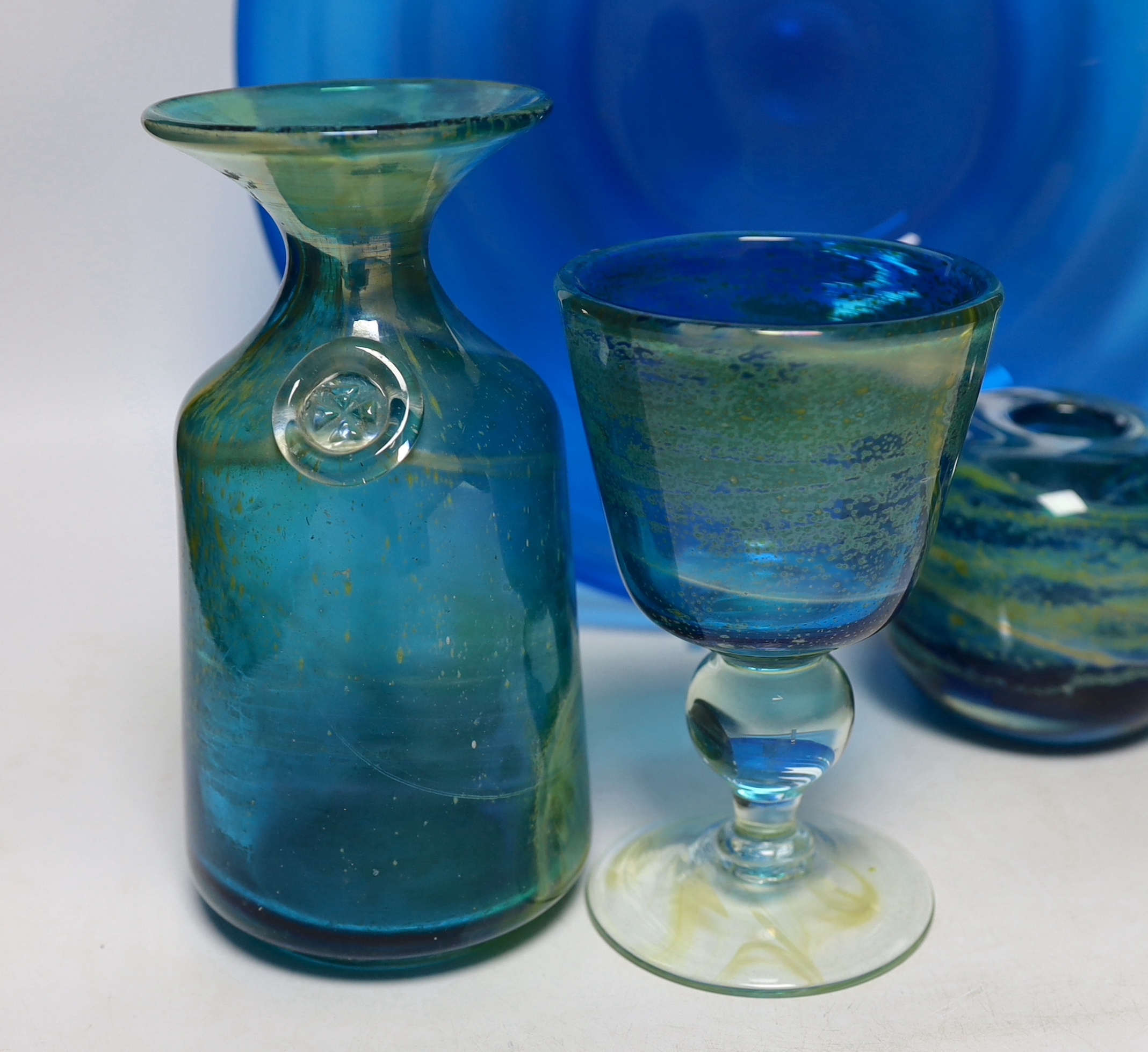 Four pieces of Mdina glass, three signed together with a blue glass dish, largest Mdina vase 19.5cm high